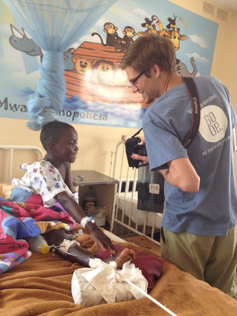 “Mommy, this man took my picture with a big machine.” A smile is a beautiful thing.