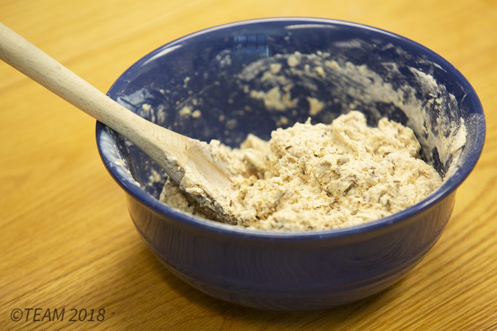 The Irish soda bread dough mixture should be thick once all of the ingredients are mixed together.