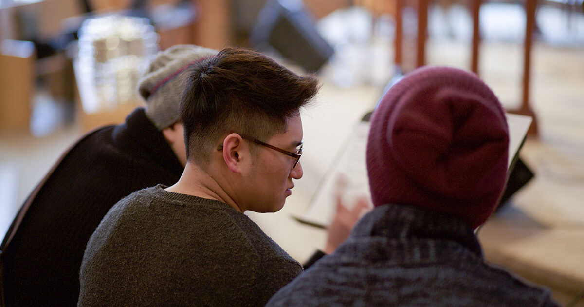 A potential missionary sits with his friends to discuss how to become a missionary