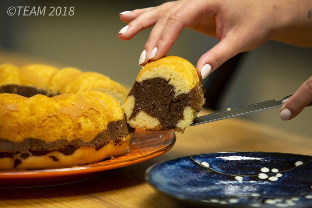 Cut and serve the cake.