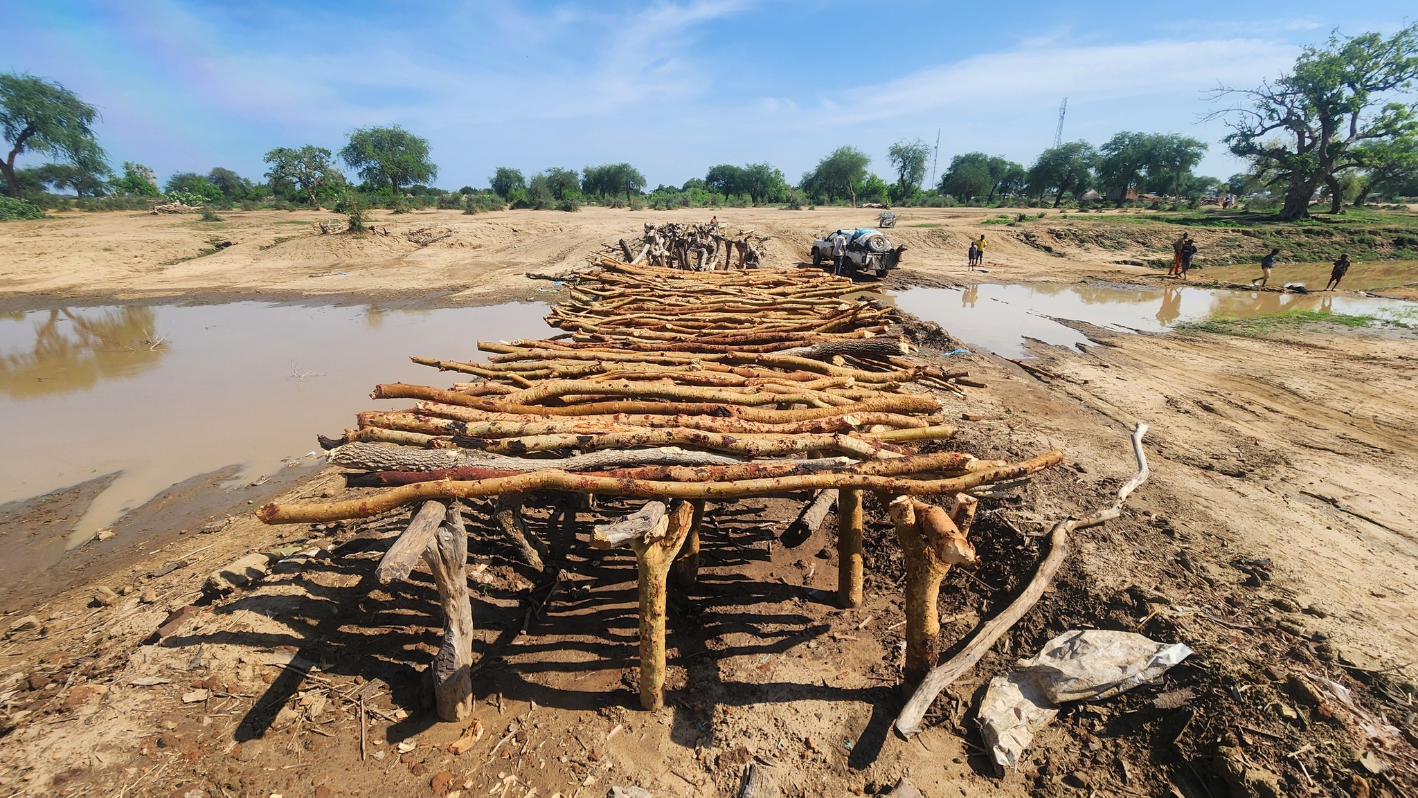 Building a bridge over the river in Africa.