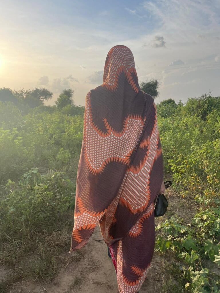 women walking through field sharing the hope of Jesus