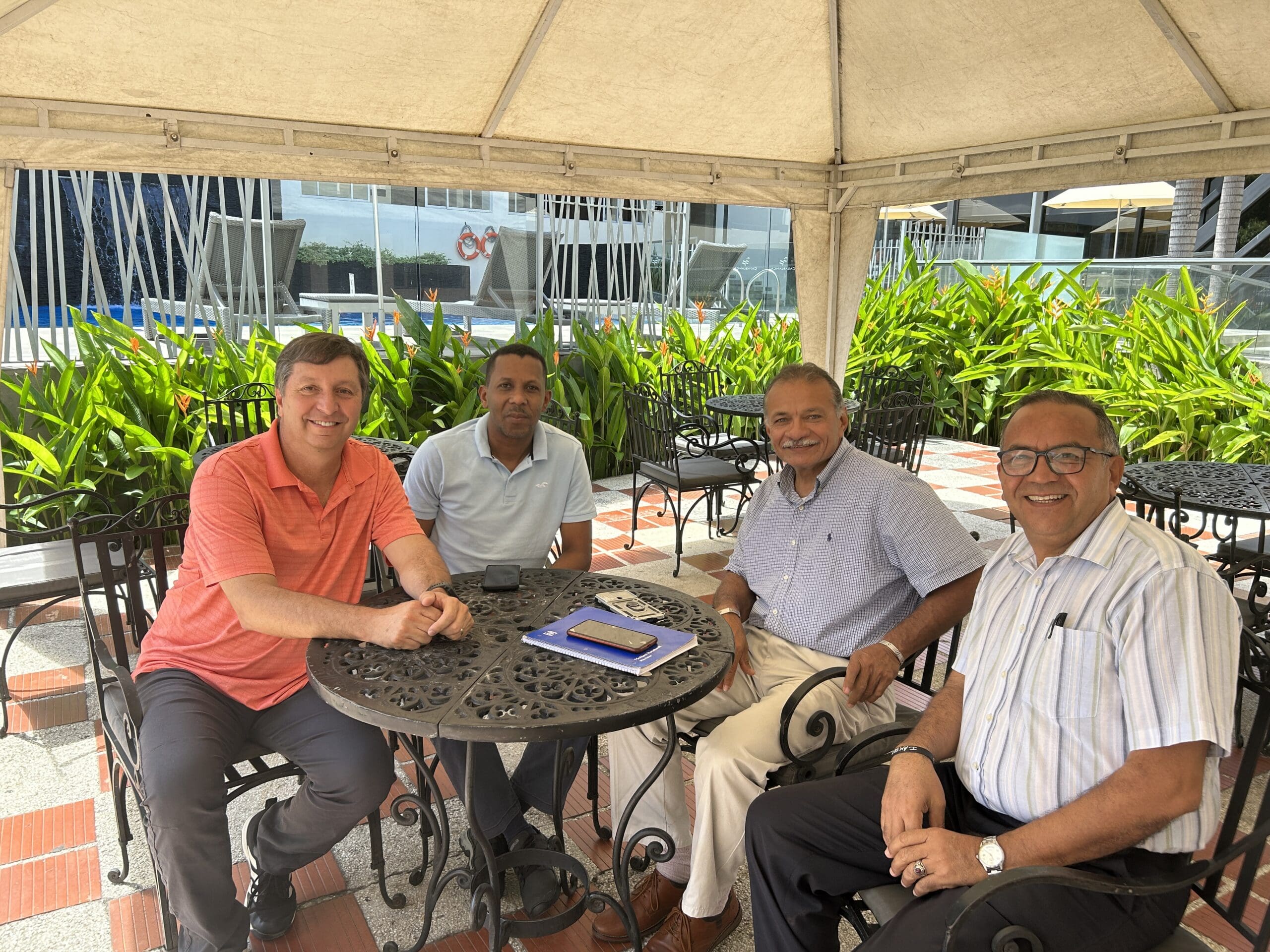 Group of pastors sitting at a table.