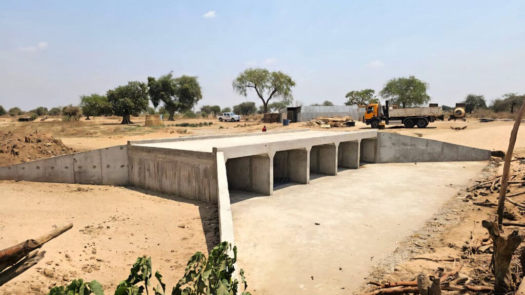 a completed concrete bridge built for a community development ministry in Chad