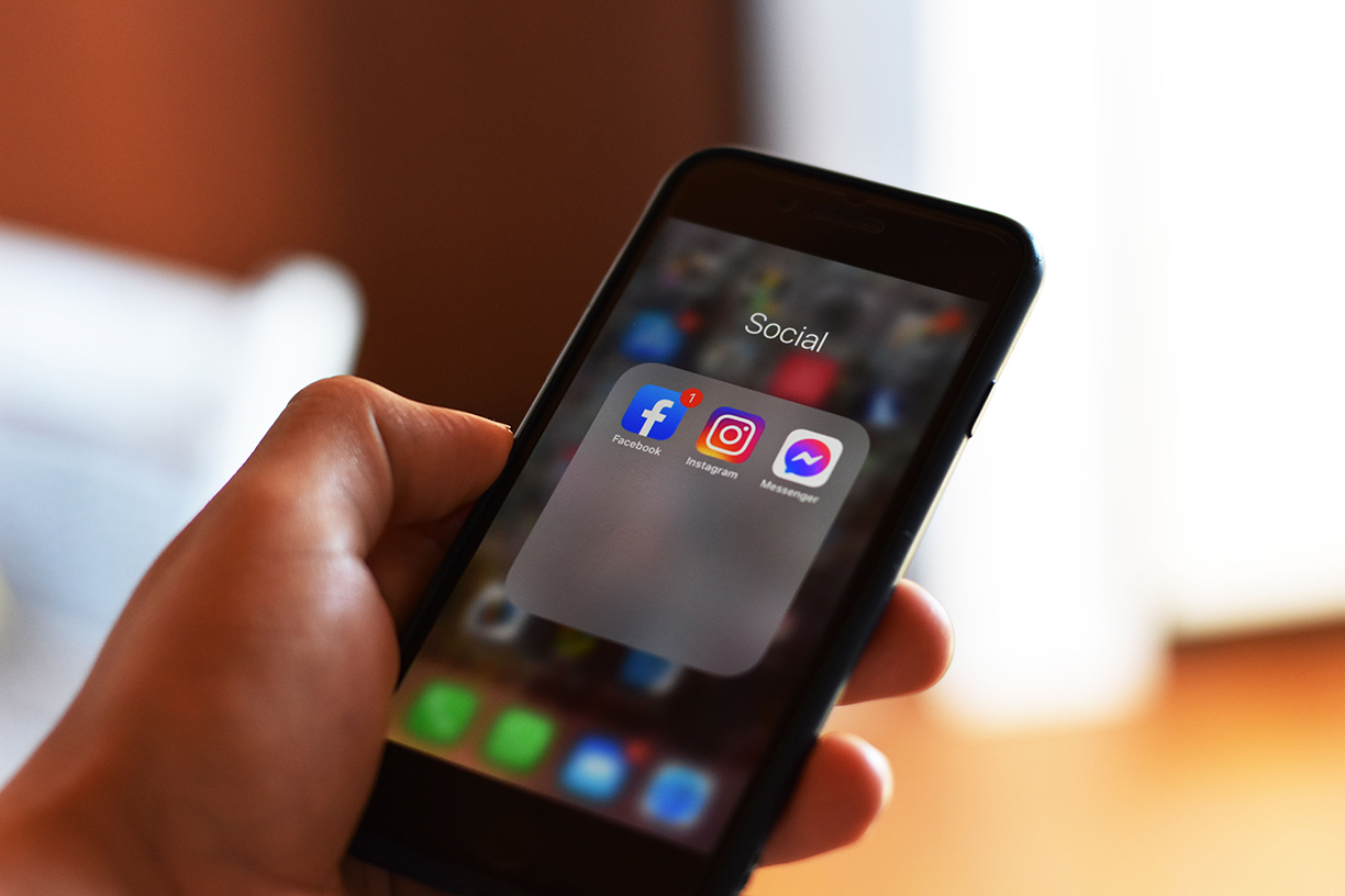 Social media icons on a phone.