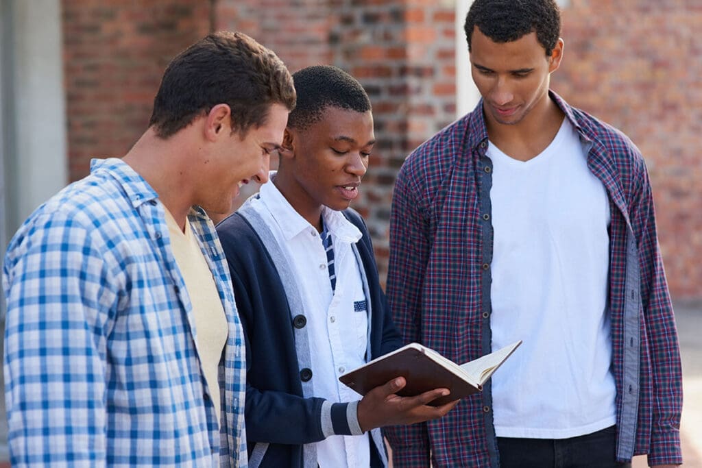 young men studying together